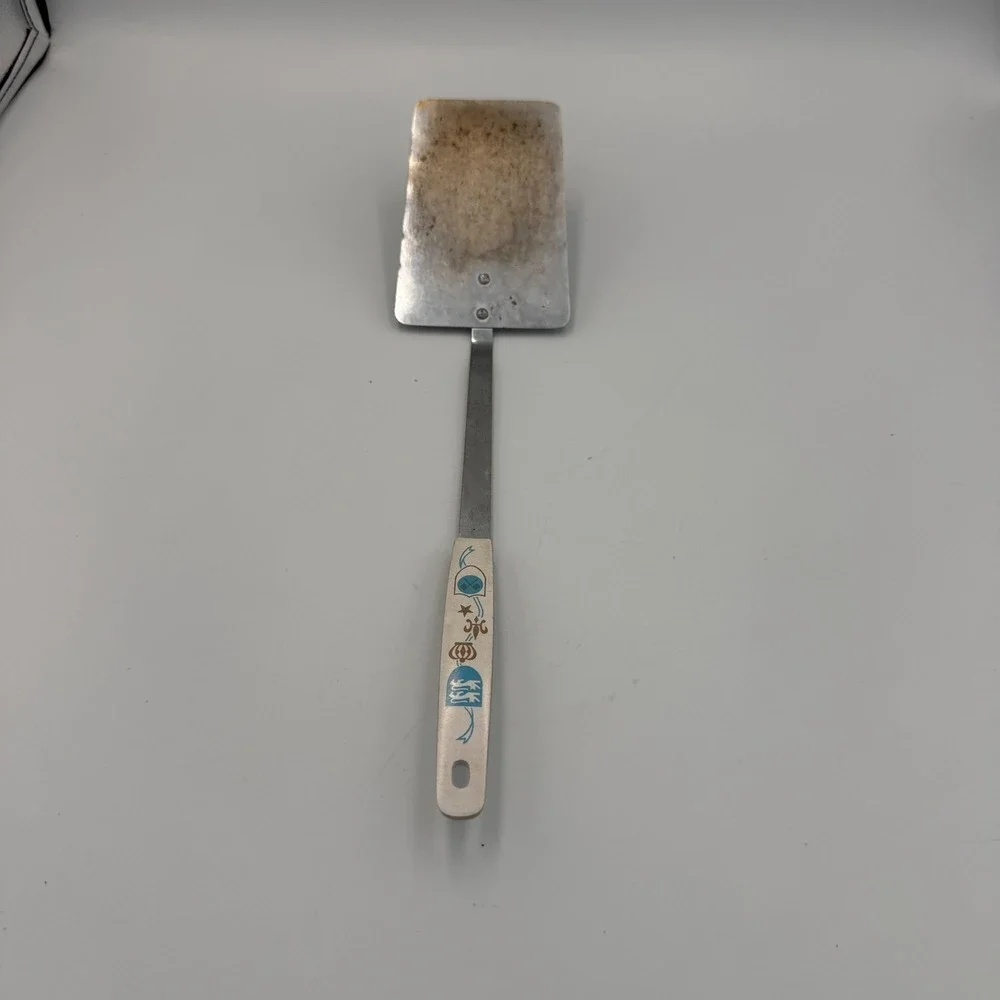 Vintage Household Japan Deluxe Spatula Heraldic Crest White Handle Stainless